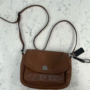 Coach crossbody women’s leather tan bag